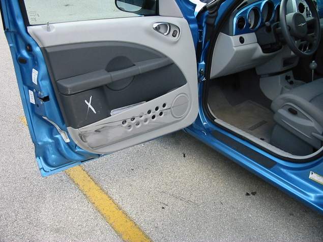 Inside door of rental car where a US customs car struck pedestrian in Coconut Grove, Florida resulting in tibia fracture and surgery