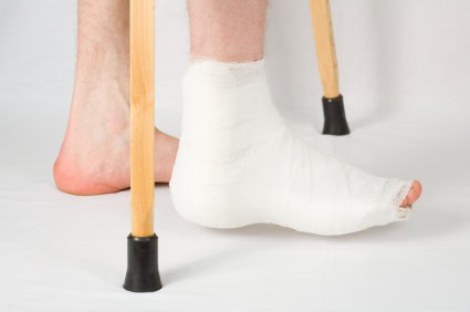 Foot/Ankle in cast with crutches.