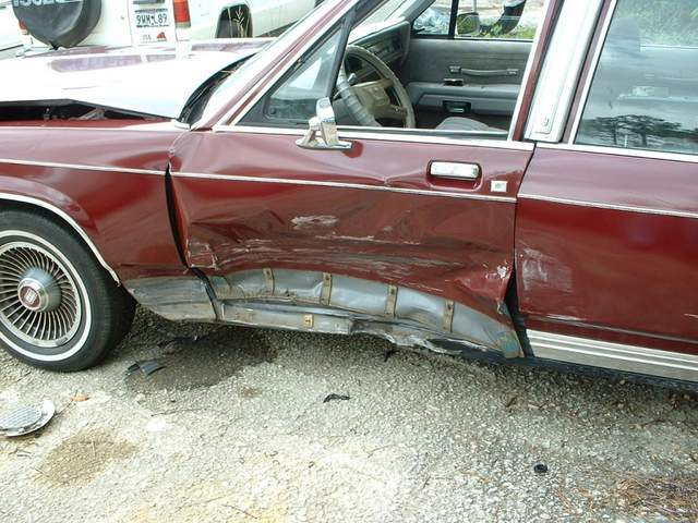 Left driver side and front damage to car