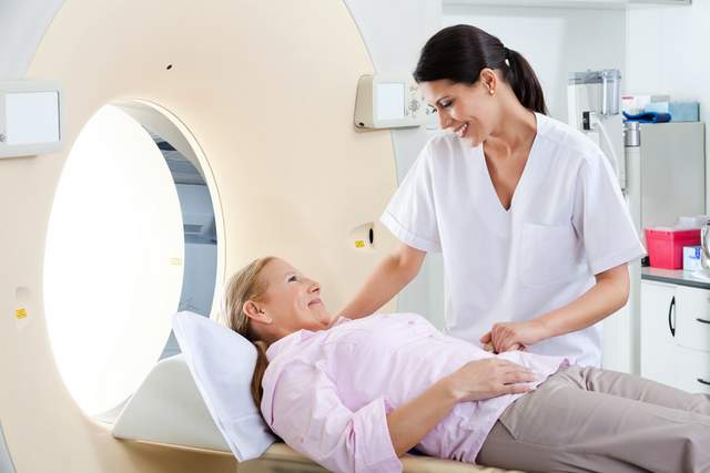 Injured person MRI and CT scan to detect herniated disc