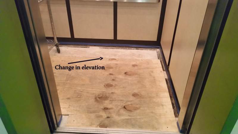 Injury claim for a trip and fall on an uneven plywood floor in a Pinecrest, Miami-Dade County, condominium elevator.
