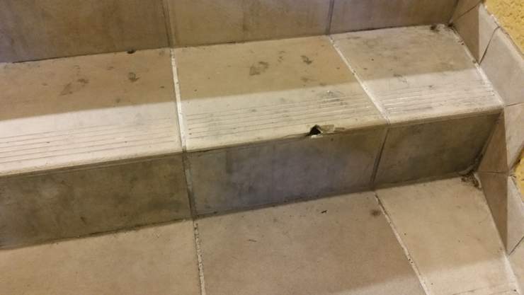 Slip and Fall on chipped tile in a South Miami, Florida mall. Injury claim.