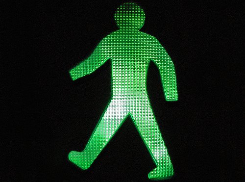 Pedestrian walking sign.