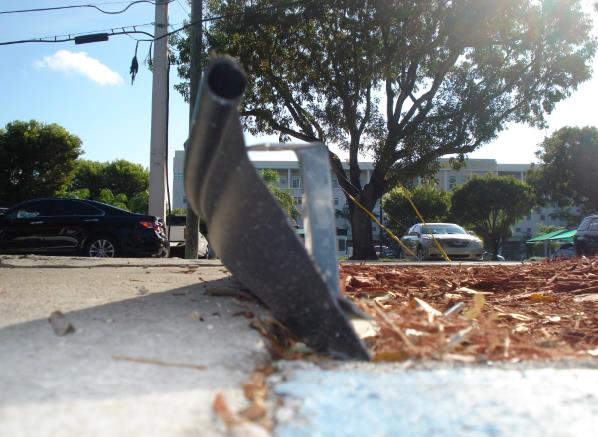 Vinyl landscape edge protruding onto sidewalk 