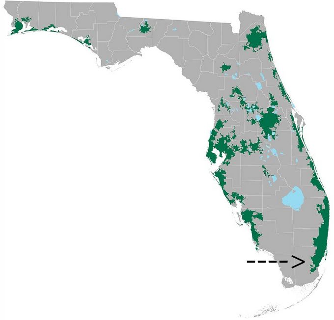 Green areas are highly populated. Arrow shows Miami-Dade County