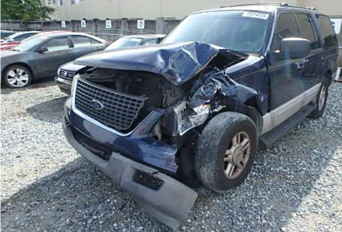 front crush damage to SUV at tow yard