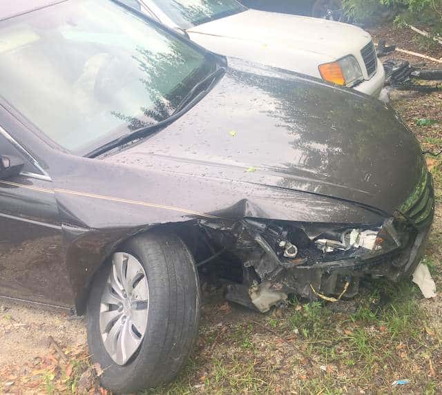 Big damage to front passenger side of Honda Accord,. The Wheel is severely bent, making the car undrivable. 