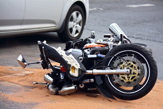 motorcycle hit by car