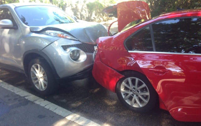 rear end crash: damage to front of car that crashed into the back of another