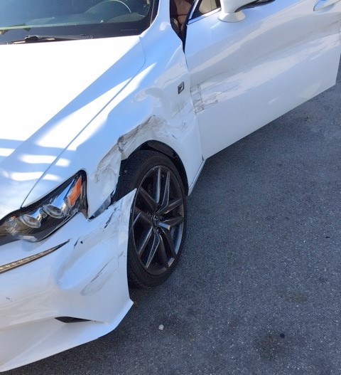 damage to the Uber car after a t-bone crash