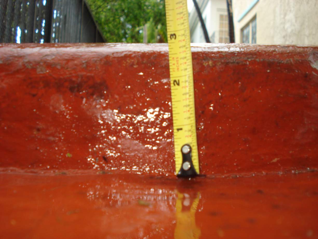 photo showing change in height (a curb) on a property that is a trip hazard