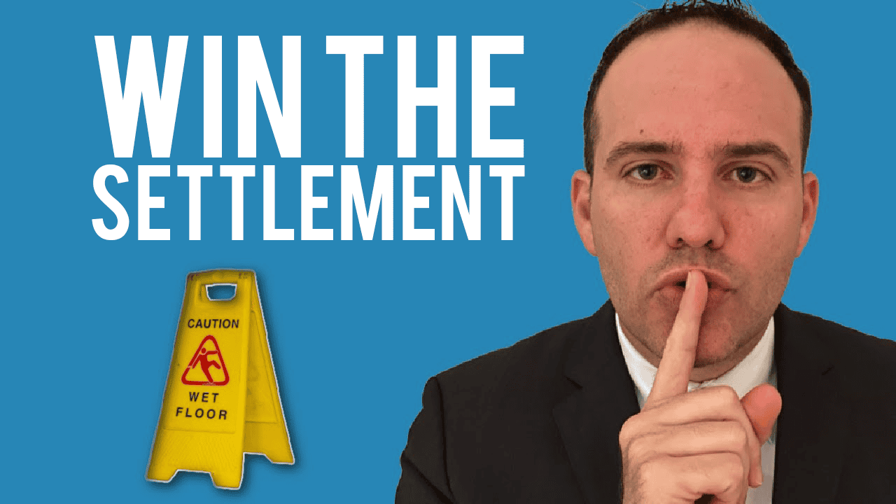 Win the Settlement (attorney Justin Ziegler). caution wet floor sign. 